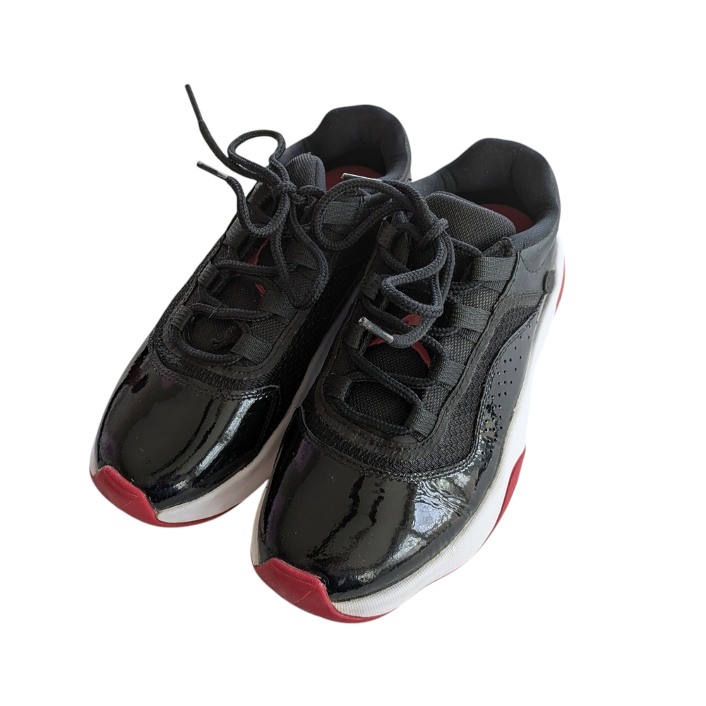 Air Jordan 11 CMFT Black and Red Low-Top Sneakers